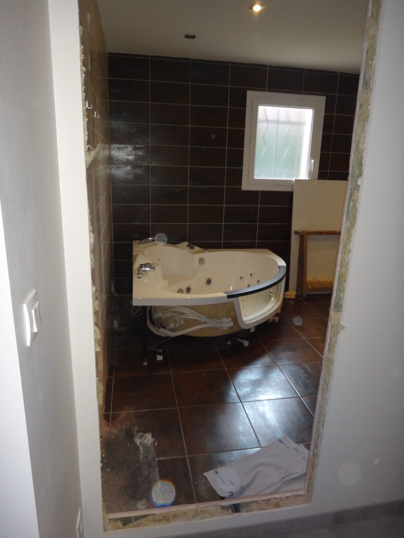 Optimisation des espaces Aménagement fonctionnel des espaces lors de la rénovation de la salle de bain - Travaux cohérents sur l'ensemble de l'habitation